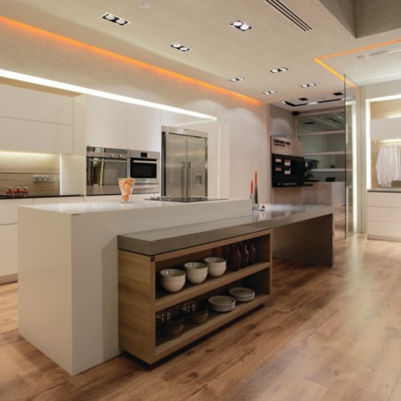 White kitchen with timber island built by Norbert Braun